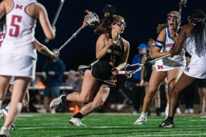 University earns Mohawk Bowl victory over MHS on Lauren's Wish night